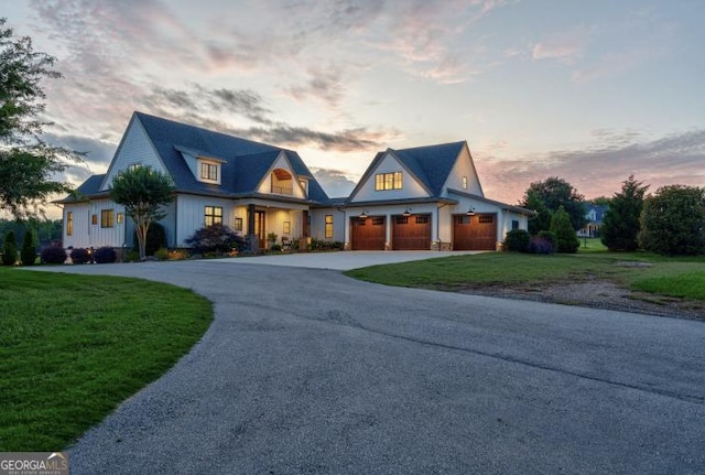 3315 Chandler Rd, Good Hope, GA 30641 - view of front of property featuring curved driveway, a yard, and an attached garage