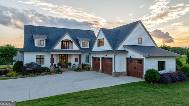3315 Chandler Rd, Good Hope, GA 30641 - modern farmhouse with covered porch, concrete driveway, a standing seam roof, a front lawn, and a metal roof