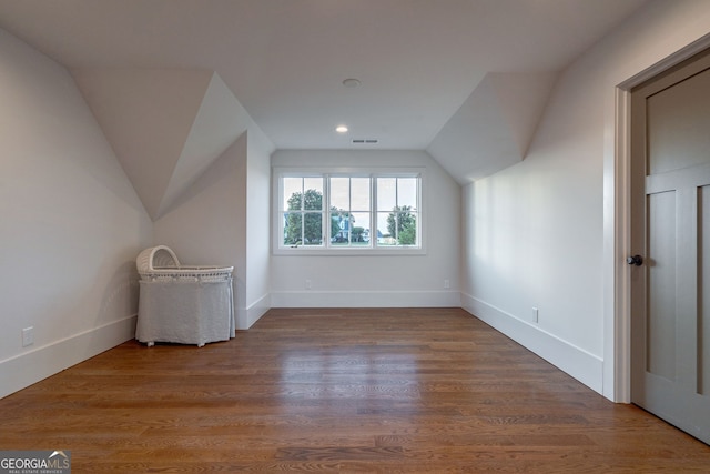 3315 Chandler Rd, Good Hope, GA 30641 - additional living space with vaulted ceiling, wood finished floors, baseboards, and recessed lighting