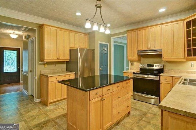 2212 Mcquiston Dr SW, Marietta, GA 30064 - kitchen with stainless steel appliances, under cabinet range hood, crown molding, light brown cabinets, and a center island