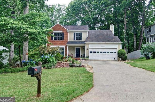 2212 Mcquiston Dr SW, Marietta, GA 30064 - traditional home with a chimney, an attached garage, and driveway