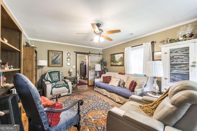 4009 Gray Hwy, Gray, GA 31032 - living area featuring a barn door, ornamental molding, ceiling fan, and wood finished floors