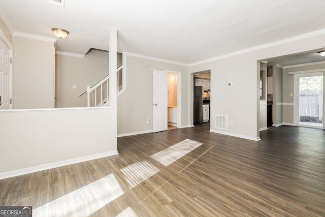 687 Redland Dr Unit 687, Riverdale, GA 30238 - unfurnished living room featuring wood finished floors, crown molding, and stairs