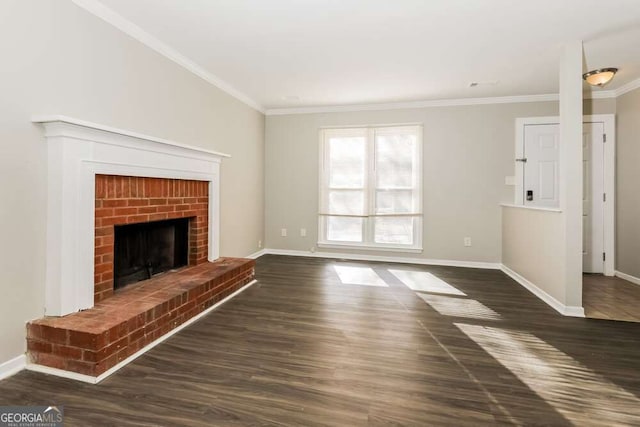 687 Redland Dr Unit 687, Riverdale, GA 30238 - unfurnished living room with ornamental molding, dark wood-style flooring, and a brick fireplace