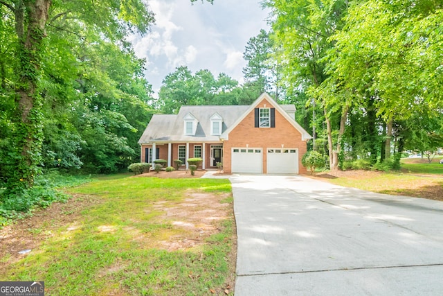 70 Sylvia Cir, Covington, GA 30016 - view of front facade with concrete driveway, a garage, brick siding, a porch, and a front yard