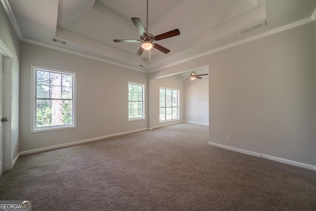 70 Sylvia Cir, Covington, GA 30016 - carpeted spare room with a raised ceiling, a ceiling fan, baseboards, and ornamental molding