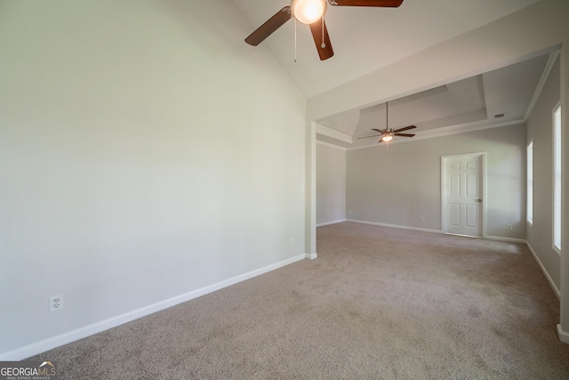 70 Sylvia Cir, Covington, GA 30016 - carpeted spare room with a ceiling fan, baseboards, a raised ceiling, and a high ceiling