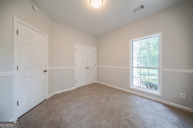 70 Sylvia Cir, Covington, GA 30016 - unfurnished bedroom featuring carpet flooring and baseboards