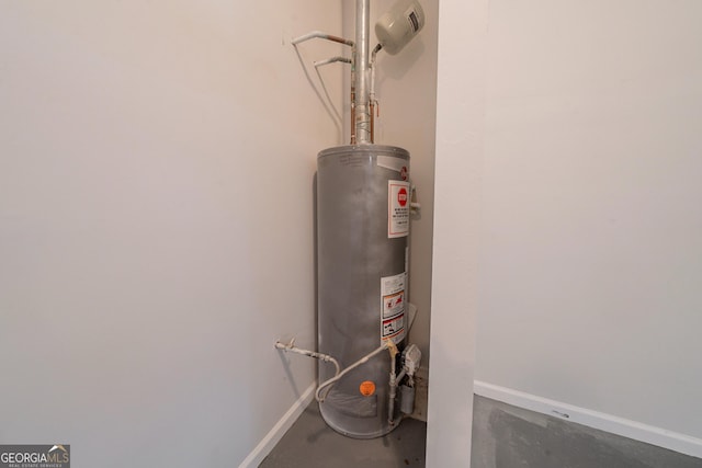 70 Sylvia Cir, Covington, GA 30016 - utility room featuring gas water heater