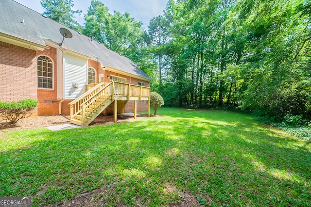 70 Sylvia Cir, Covington, GA 30016 - view of green lawn featuring stairs and a wooden deck