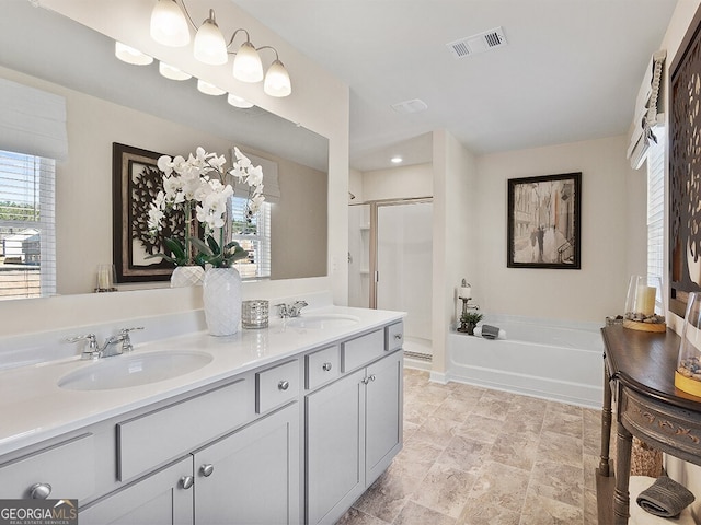 366 Lost Creek Blvd, Dallas, GA 30132 - full bathroom with a shower stall, a garden tub, double vanity, and stone finish flooring