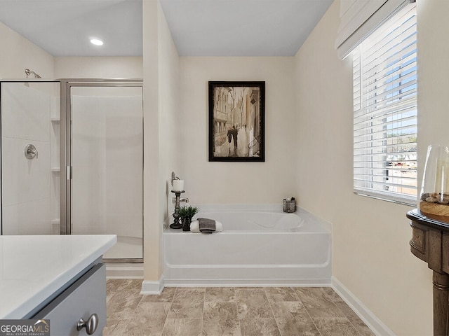 366 Lost Creek Blvd, Dallas, GA 30132 - full bathroom with a garden tub, a stall shower, baseboards, and vanity