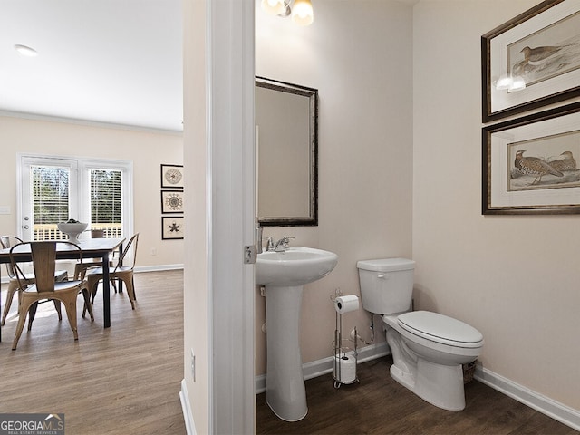 366 Lost Creek Blvd, Dallas, GA 30132 - bathroom with toilet, baseboards, wood finished floors, and a sink