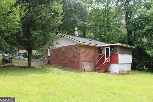 8469 Shiloh Ct, Jonesboro, GA 30238 - ranch-style home with a front yard and brick siding