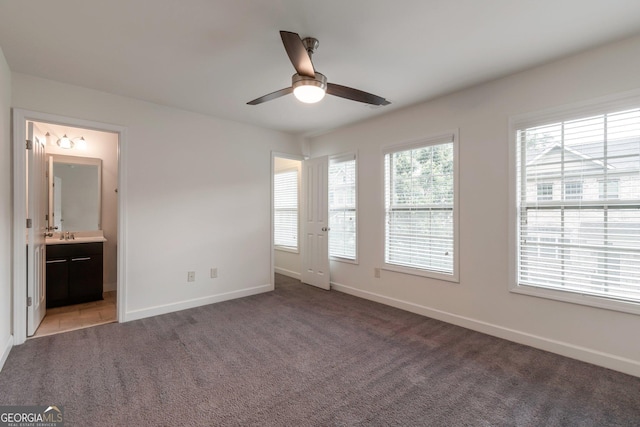 7850 Willoughby Ct, Alpharetta, GA 30005 - unfurnished bedroom featuring carpet floors, connected bathroom, and ceiling fan