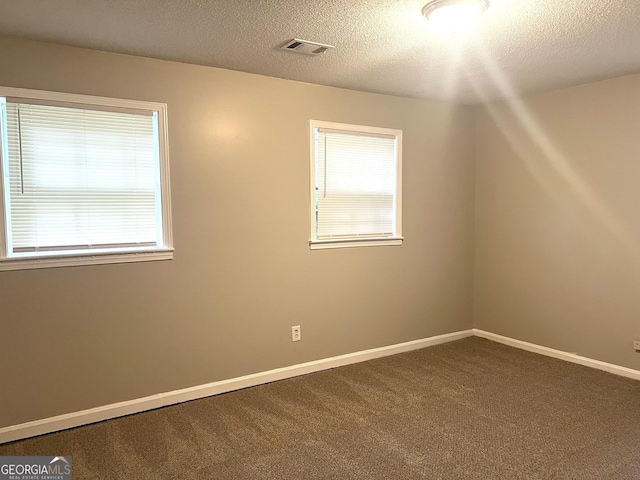 4196 Lehigh Blvd, Decatur, GA 30034 - spare room featuring carpet floors, a textured ceiling, and baseboards