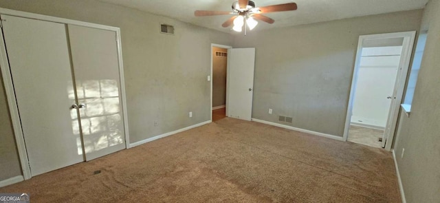 3226 Bruckner Blvd, Snellville, GA 30078 - unfurnished bedroom featuring carpet flooring, baseboards, and ceiling fan
