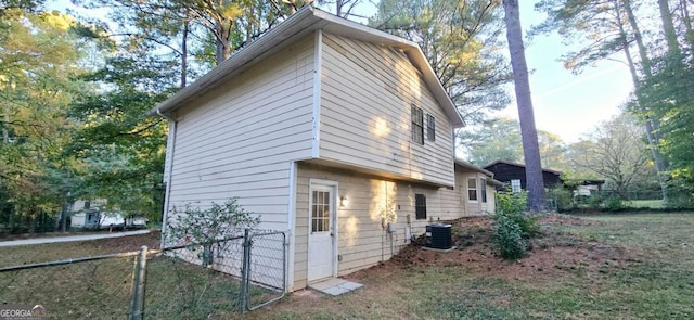 3226 Bruckner Blvd, Snellville, GA 30078 - view of side of home featuring central AC unit and a gate