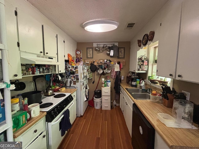 992 Tom Bell Rd, Cleveland, GA 30528 - kitchen with under cabinet range hood, a sink, white appliances, wood finished floors, and a textured ceiling