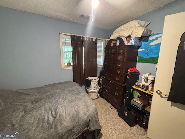 992 Tom Bell Rd, Cleveland, GA 30528 - carpeted bedroom featuring a textured ceiling