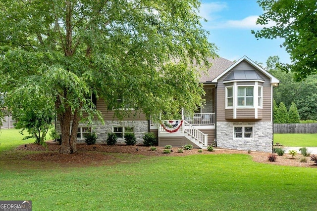 15 Split Oak Dr SW, Cartersville, GA 30120 - view of front of house featuring stone siding, stairway, and a porch