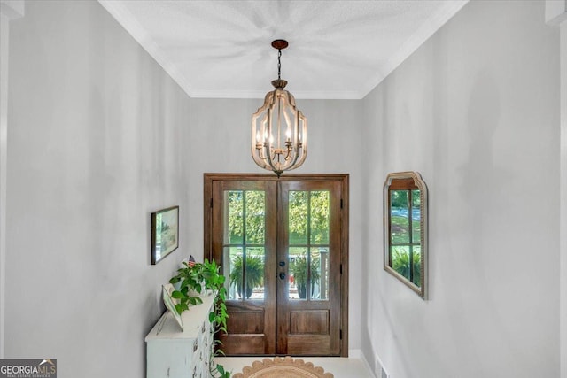 15 Split Oak Dr SW, Cartersville, GA 30120 - foyer with a chandelier, french doors, and ornamental molding