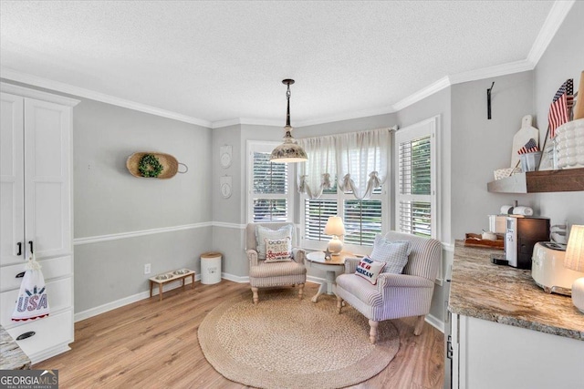 15 Split Oak Dr SW, Cartersville, GA 30120 - sitting room with light wood-style floors, a textured ceiling, plenty of natural light, ornamental molding, and baseboards