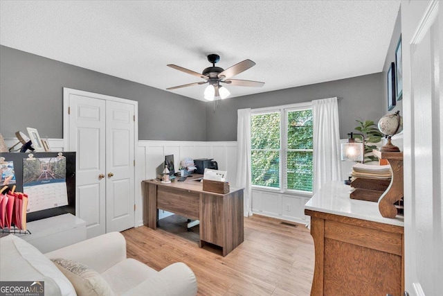 15 Split Oak Dr SW, Cartersville, GA 30120 - office space with light wood-type flooring, ceiling fan, a textured ceiling, and a wainscoted wall
