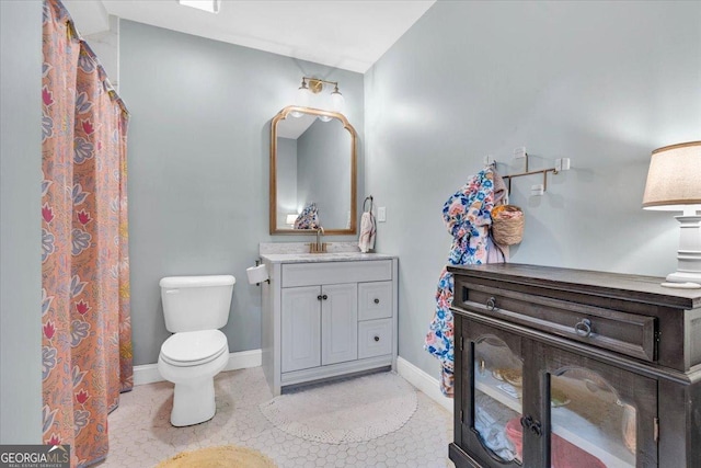 15 Split Oak Dr SW, Cartersville, GA 30120 - full bath with toilet, vanity, baseboards, and tile patterned floors