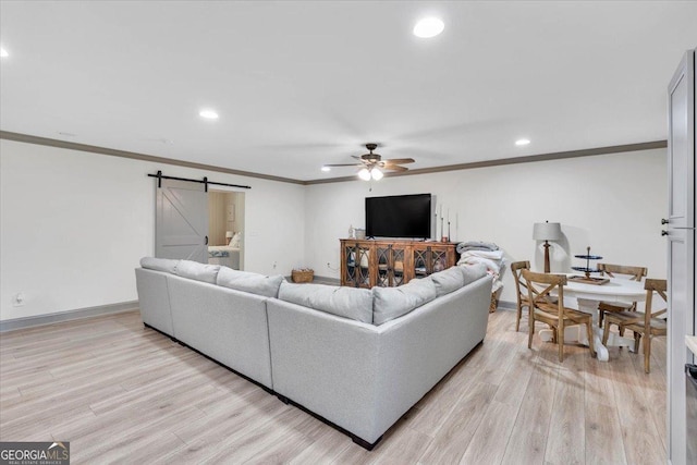 15 Split Oak Dr SW, Cartersville, GA 30120 - living area featuring a barn door, a ceiling fan, light wood-type flooring, ornamental molding, and recessed lighting