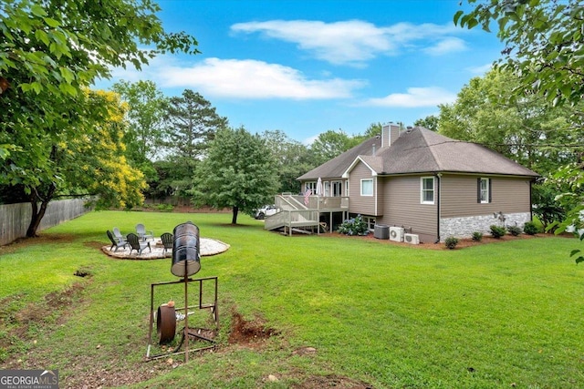 15 Split Oak Dr SW, Cartersville, GA 30120 - view of yard featuring a wooden deck and a fire pit