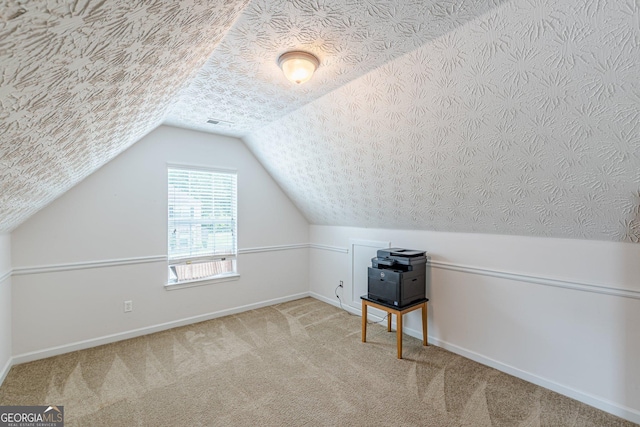118 Surge Stone Ln, Stockbridge, GA 30281 - bonus room featuring carpet flooring and lofted ceiling