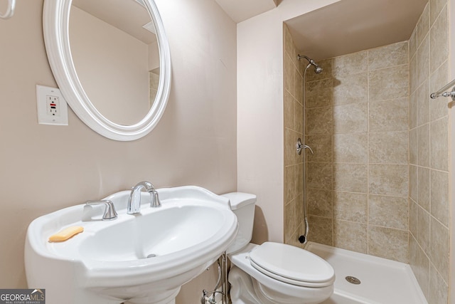 118 Surge Stone Ln, Stockbridge, GA 30281 - bathroom featuring a sink and tiled shower