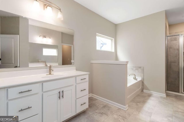 4000 Red Canoe Bnd, Lilburn, GA 30047 - full bathroom featuring vanity, baseboards, a bath, and a shower stall