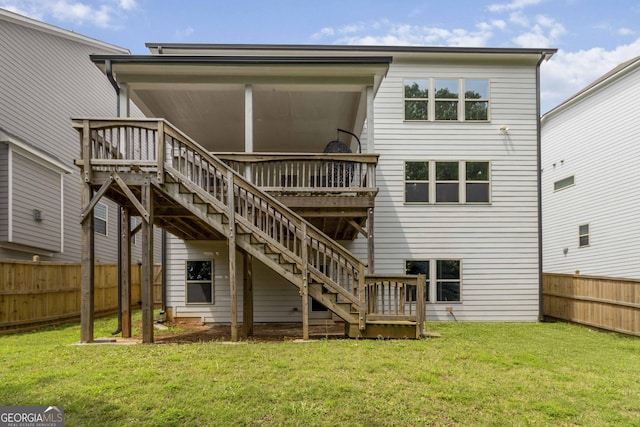 4000 Red Canoe Bnd, Lilburn, GA 30047 - rear view of property with stairway and a deck