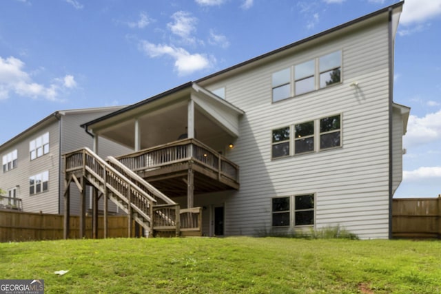 4000 Red Canoe Bnd, Lilburn, GA 30047 - rear view of property with a deck and stairway