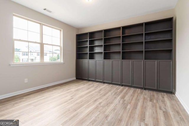 4000 Red Canoe Bnd, Lilburn, GA 30047 - spare room with light wood-type flooring and baseboards