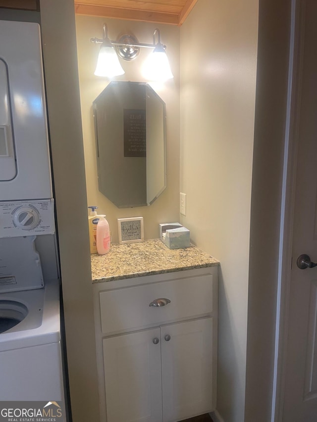 32 Yogi Bear Blvd, Cleveland, GA 30528 - bathroom with stacked washing machine and dryer and vanity
