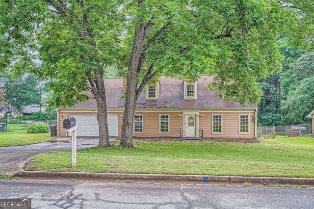 1739 Brandy Woods Trl SE, Conyers, GA 30013 - cape cod-style house with driveway, an attached garage, and a shingled roof