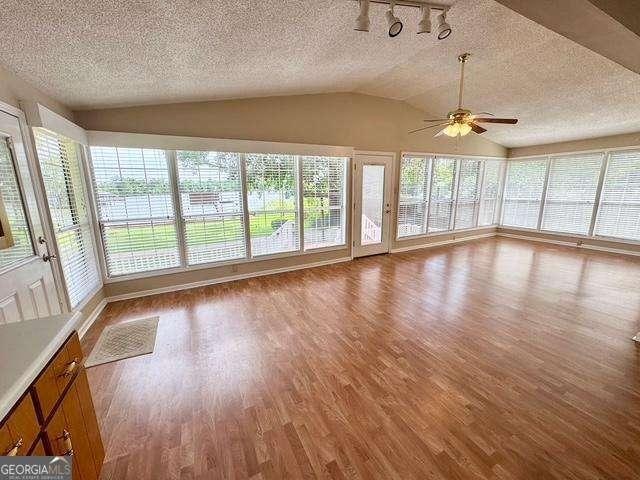 198 Swift Creek Rd, Cordele, GA 31015 - unfurnished sunroom featuring vaulted ceiling