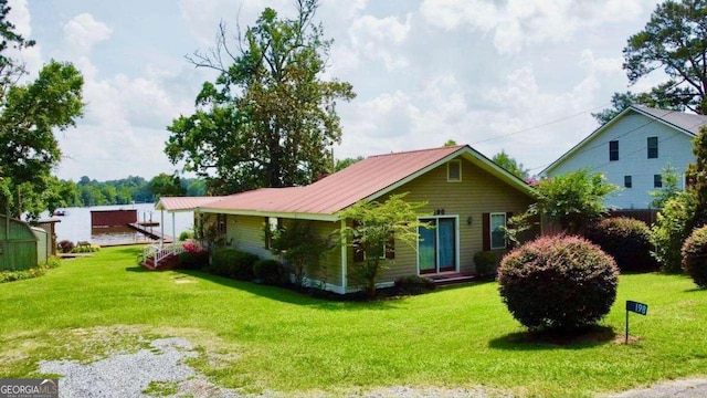 198 Swift Creek Rd, Cordele, GA 31015 - view of front of house featuring a front yard and metal roof