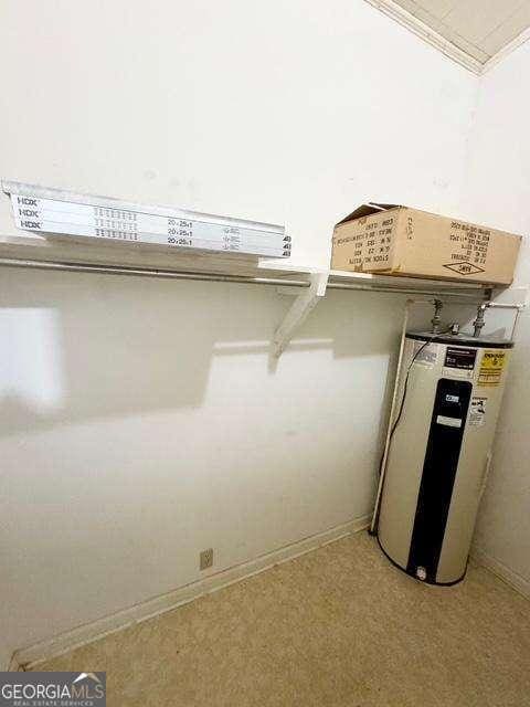 198 Swift Creek Rd, Cordele, GA 31015 - spacious closet with electric water heater and light colored carpet