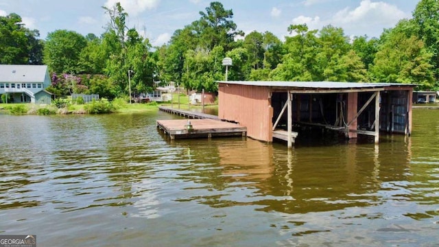 198 Swift Creek Rd, Cordele, GA 31015 - dock with a water view and view of wooded area
