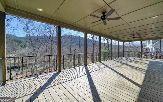 2628 Rolling River Dr, Hiawassee, GA 30546 - unfurnished sunroom with ceiling fan and a mountain view