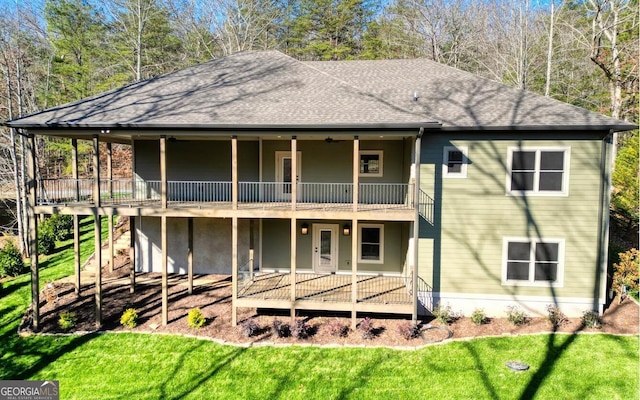 2628 Rolling River Dr, Hiawassee, GA 30546 - rear view of house with roof with shingles, a lawn, stairs, and a wooden deck