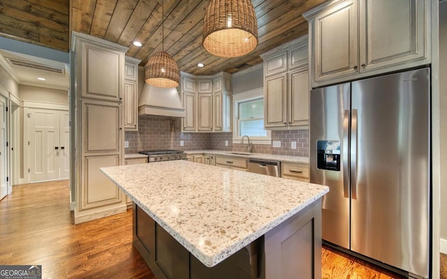 2628 Rolling River Dr, Hiawassee, GA 30546 - kitchen featuring appliances with stainless steel finishes, wood ceiling, a sink, premium range hood, and light wood-style flooring