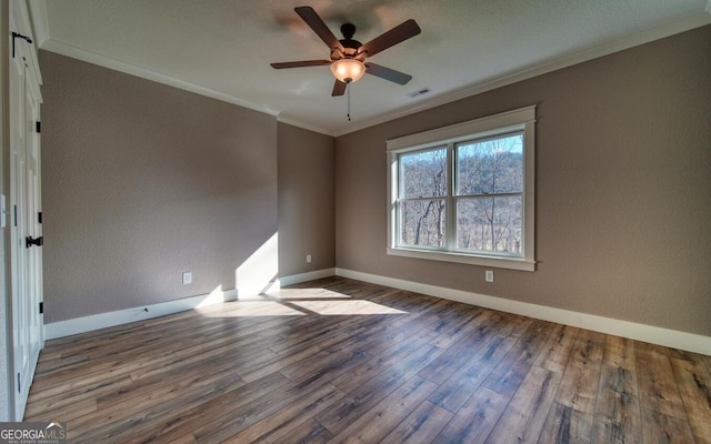 2628 Rolling River Dr, Hiawassee, GA 30546 - empty room with crown molding, wood finished floors, baseboards, and a ceiling fan