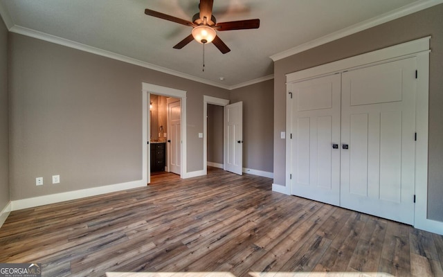 2628 Rolling River Dr, Hiawassee, GA 30546 - unfurnished bedroom with wood finished floors, baseboards, ornamental molding, a closet, and a ceiling fan