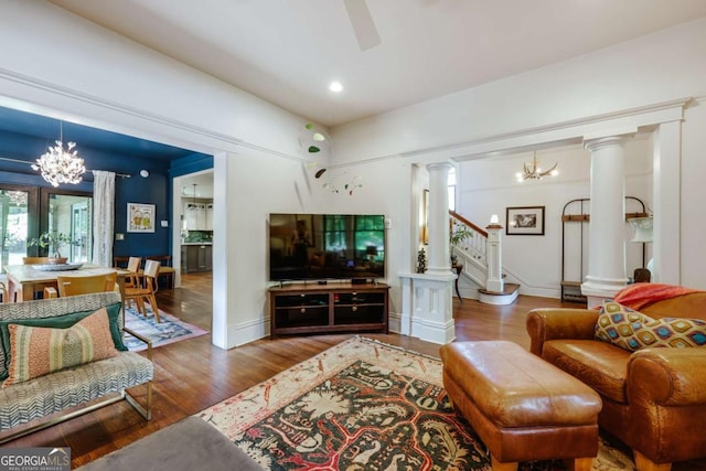 781 Boulevard, Athens, GA 30601 - living area featuring a chandelier, ornate columns, wood finished floors, stairs, and recessed lighting