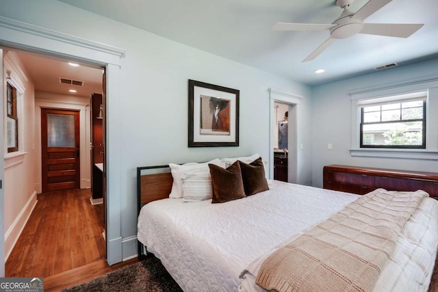 781 Boulevard, Athens, GA 30601 - bedroom featuring wood finished floors, recessed lighting, baseboards, connected bathroom, and ceiling fan
